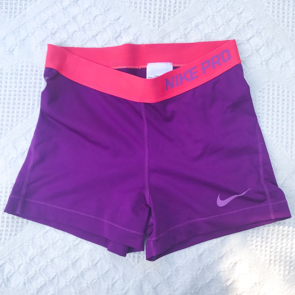 Purple Nike pros with pink band
